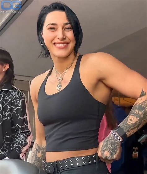 rhea ripley nipple|Rhea Ripley sends WWE fans wild in candid topless and makeup。